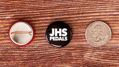 Size Comparrison of 1 Inch Button Pins with a US Quarter