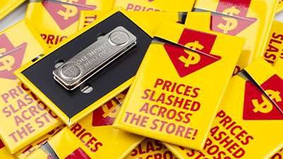 1.75"x2.75" Rectangle Magnetic Badges with Vertical Orientation Which Read "Prices Slashed Across The Store"