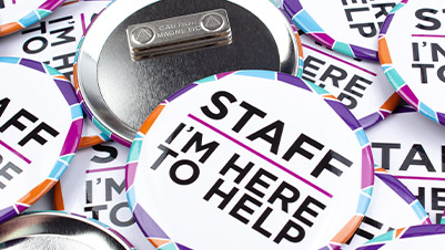 4" Round Clothing Magnets Reading "STAFF I'M HERE TO HELP"