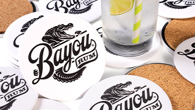 Closeup of a stack of promotional coasters for Bayou Rum