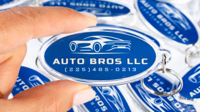 Oval keychains printed for Auto Bros LLC