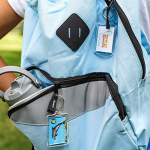 Rectangle Keychains hung on a students backpack