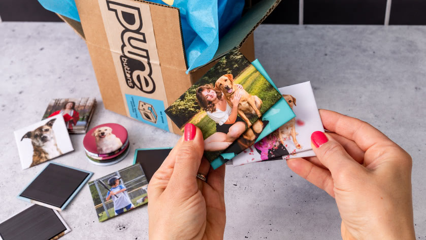 Hands Unboxing Photo Magnets from PureButtons.com