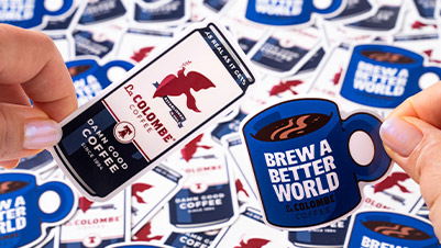 Hands Holding Die Cut Stickers for La Colombe Coffee Roasters