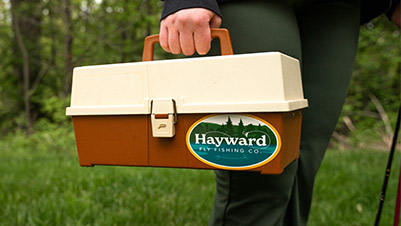 Oval Sticker for Hayward Fly Fishing Co on a Tackle Box