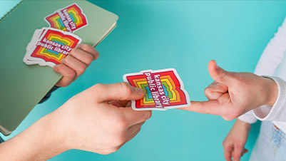 Students sharing Die Cut Glitter Stickers