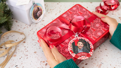 Christmas Photo Gift Ornament Hanging on Christmas Tree