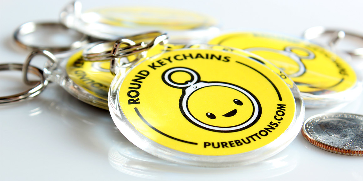 Closeup of Pure Buttons Round Acrylic Keychains
