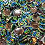 8-Bit Zombie Thrashor 1 Inch Pin-Back Buttons with Rainbow Gloss Finish