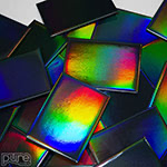 A Pile of 2.5x3.5 Rectangle Fridge Magnets with Rainbow Gloss Finish